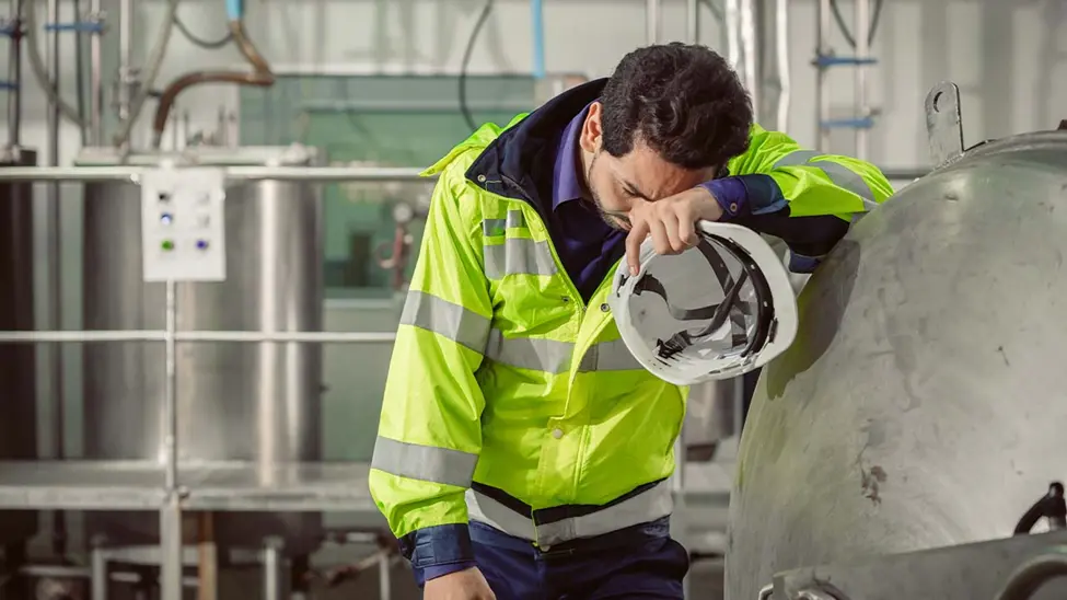 A fatigued Worker trying to get some rest